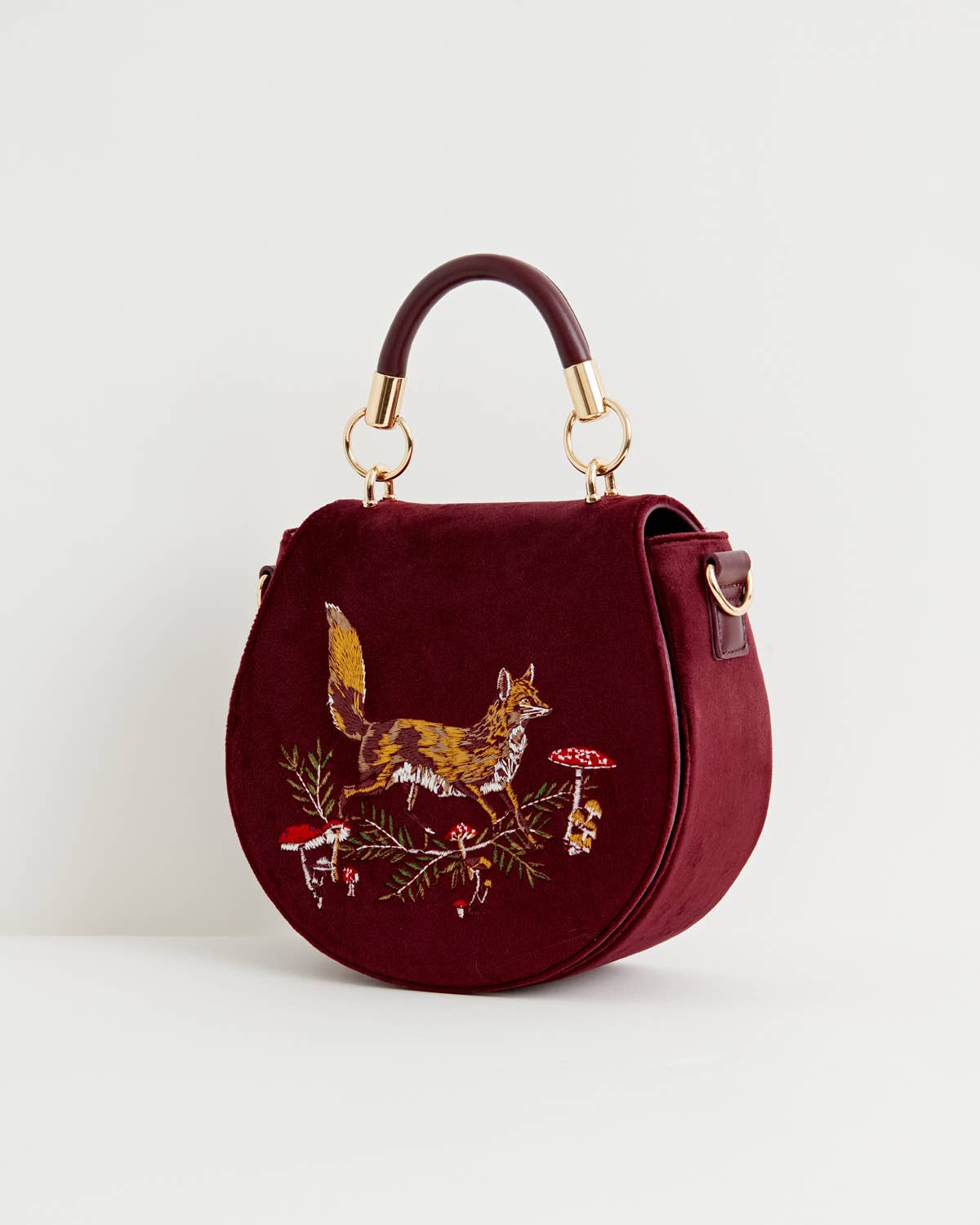 Bolso de sillín de terciopelo burdeos con bordado de zorro y hongo