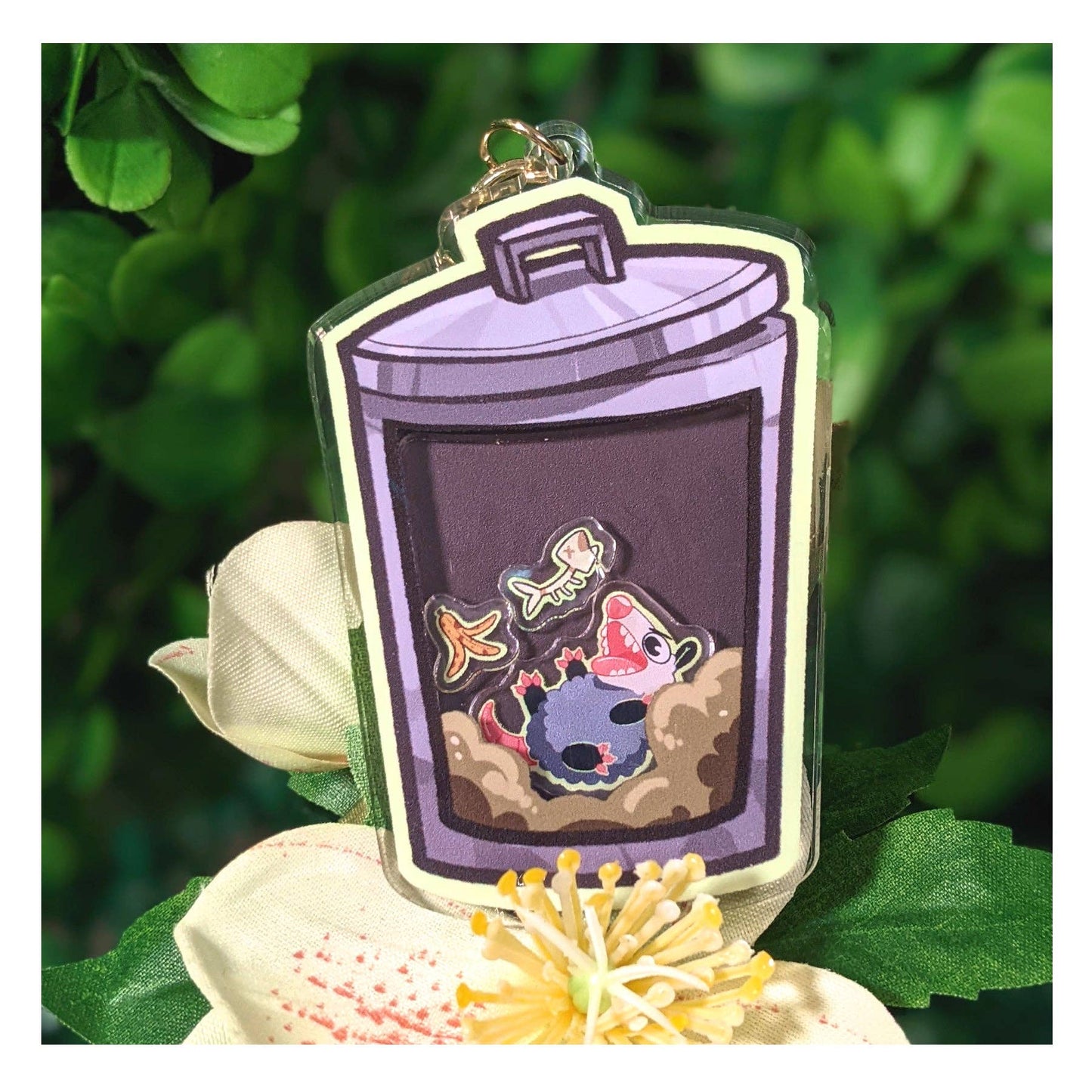 Charm de zarigüeya Trashbaby (¡se puede agitar!)