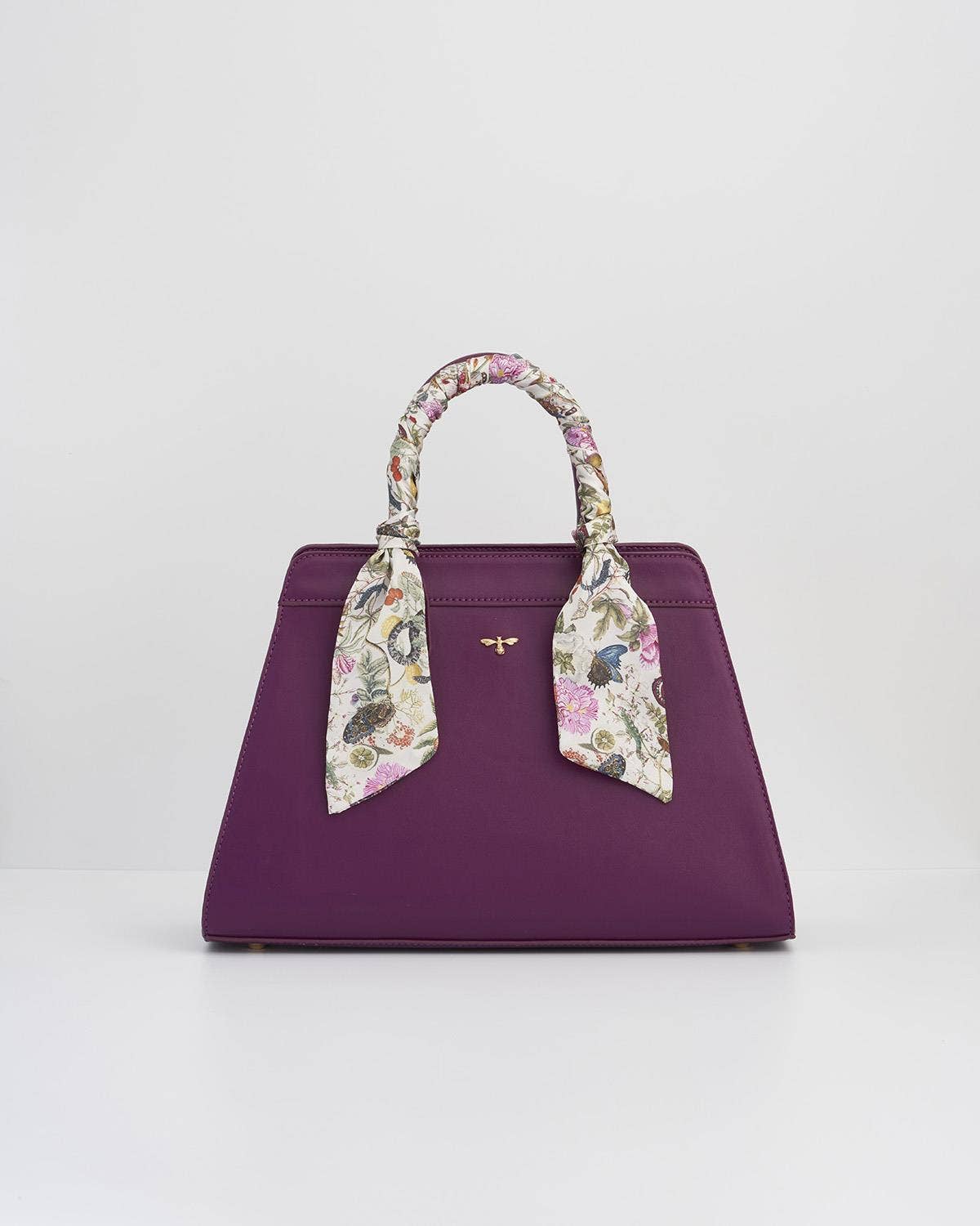 Bolso grande color ciruela con grabados florales