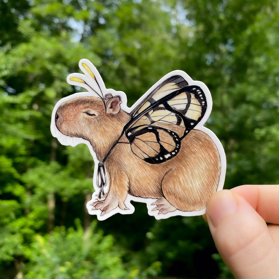 Pegatina de vinilo resistente a la intemperie con diseño de mariposa y capibara