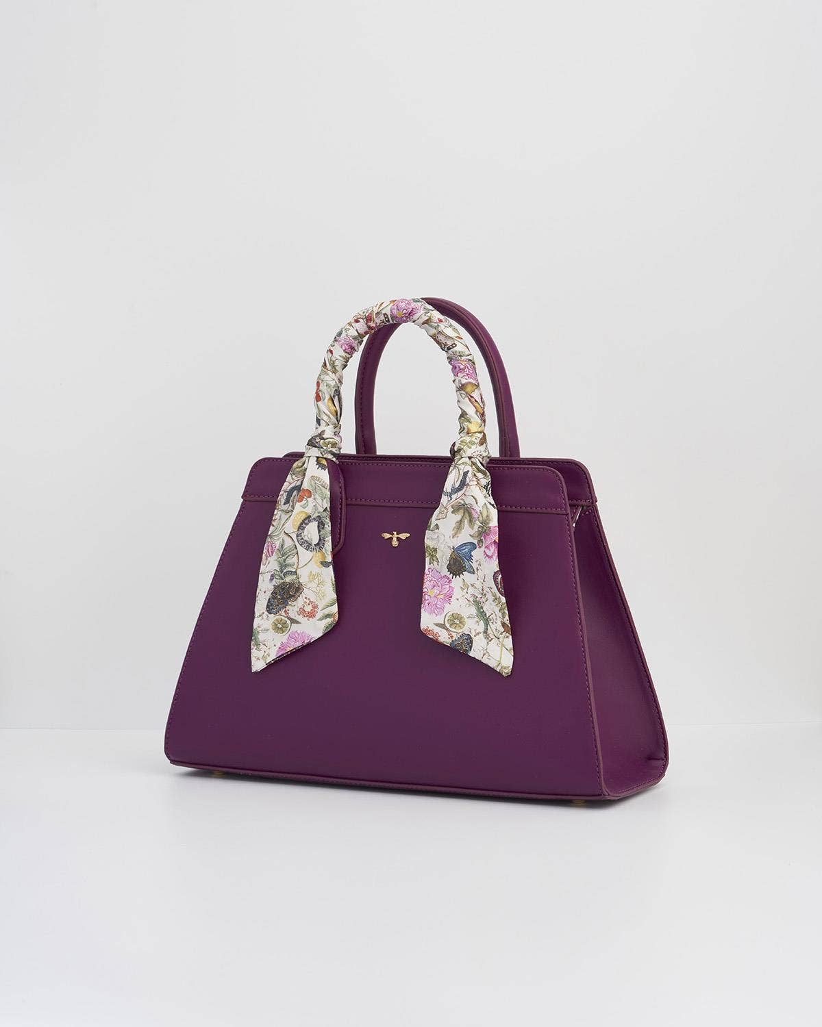Bolso grande color ciruela con grabados florales