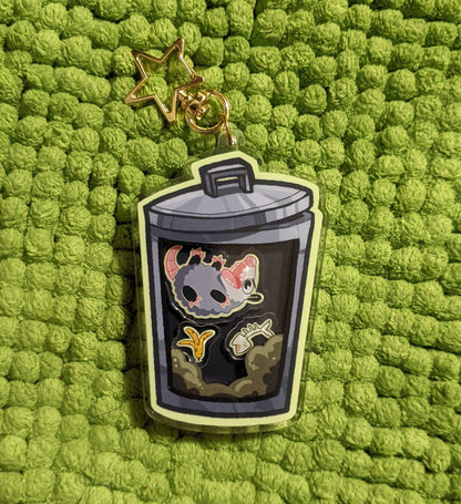 Charm de zarigüeya Trashbaby (¡se puede agitar!)