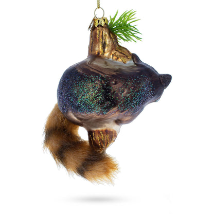 Curious Raccoon Climbing the Tree Glass Ornament